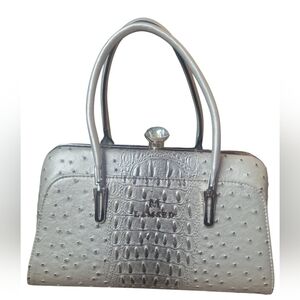 Elegant silver handbag by [M Lamsed]